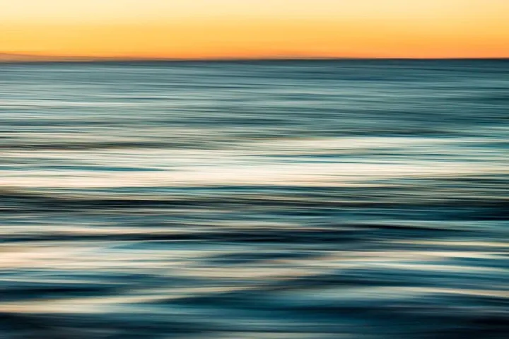 Orange sky, teal sea